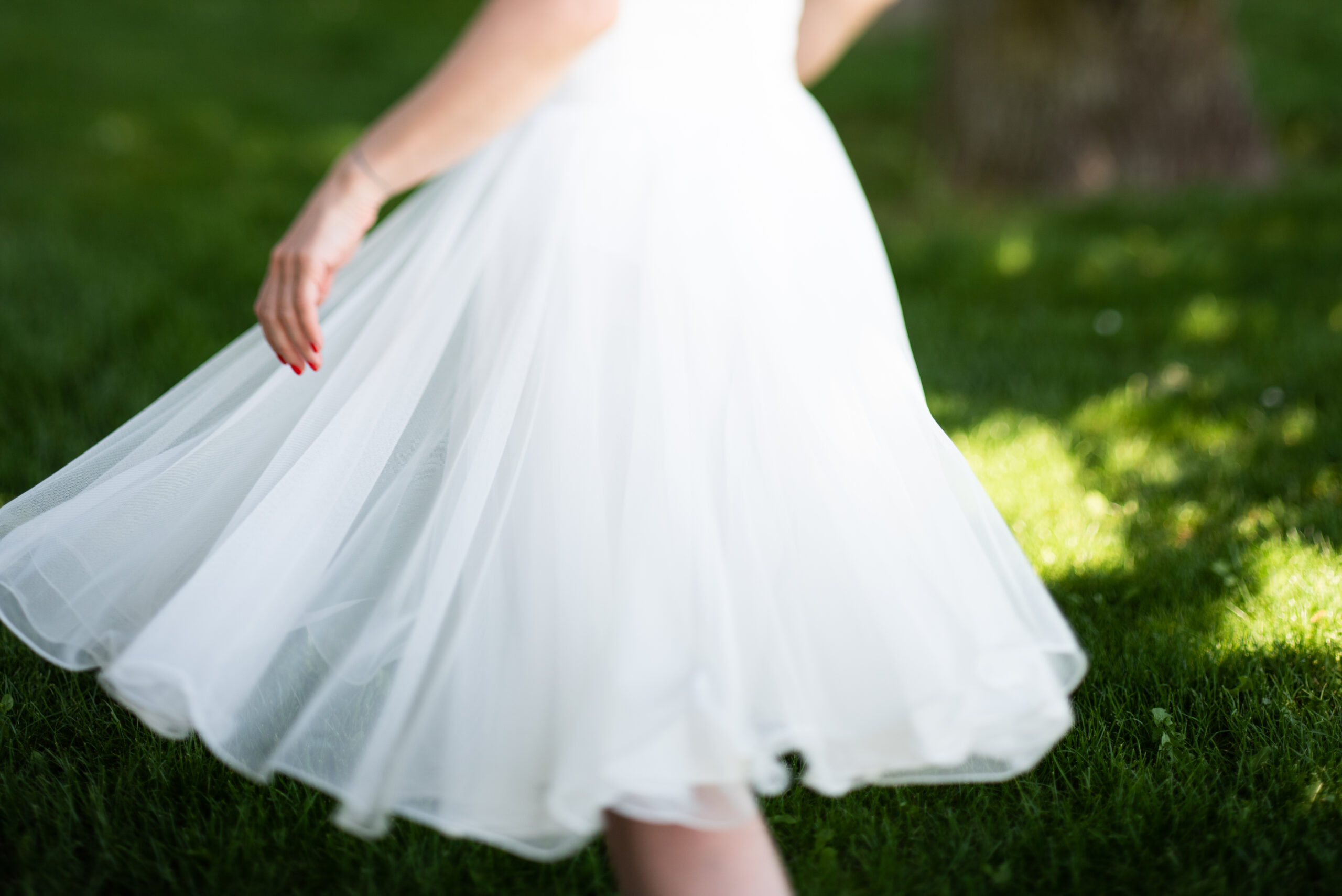 woman in wedding dress turning
