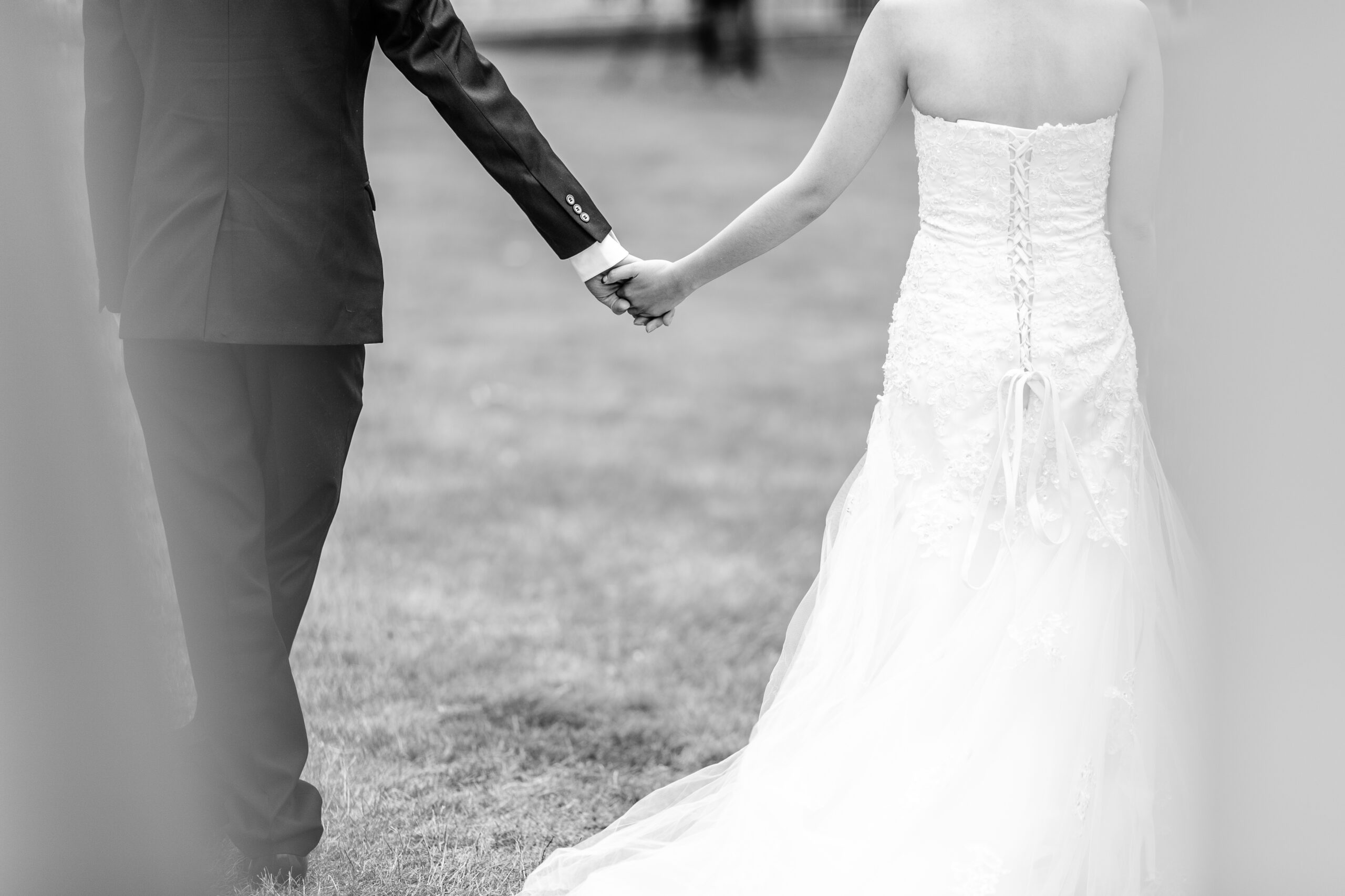 wedding couple holding hands