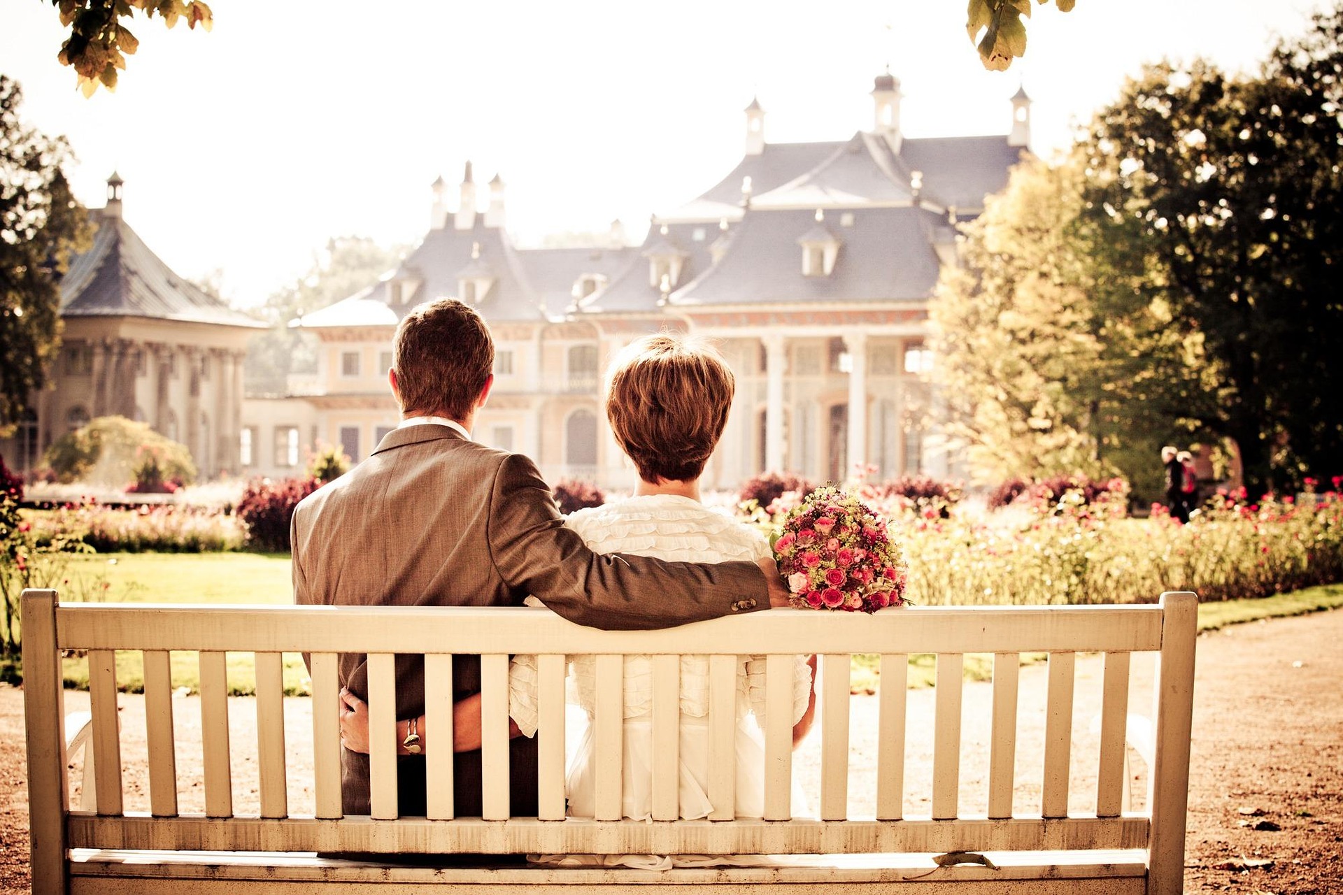 couple on bench by castle