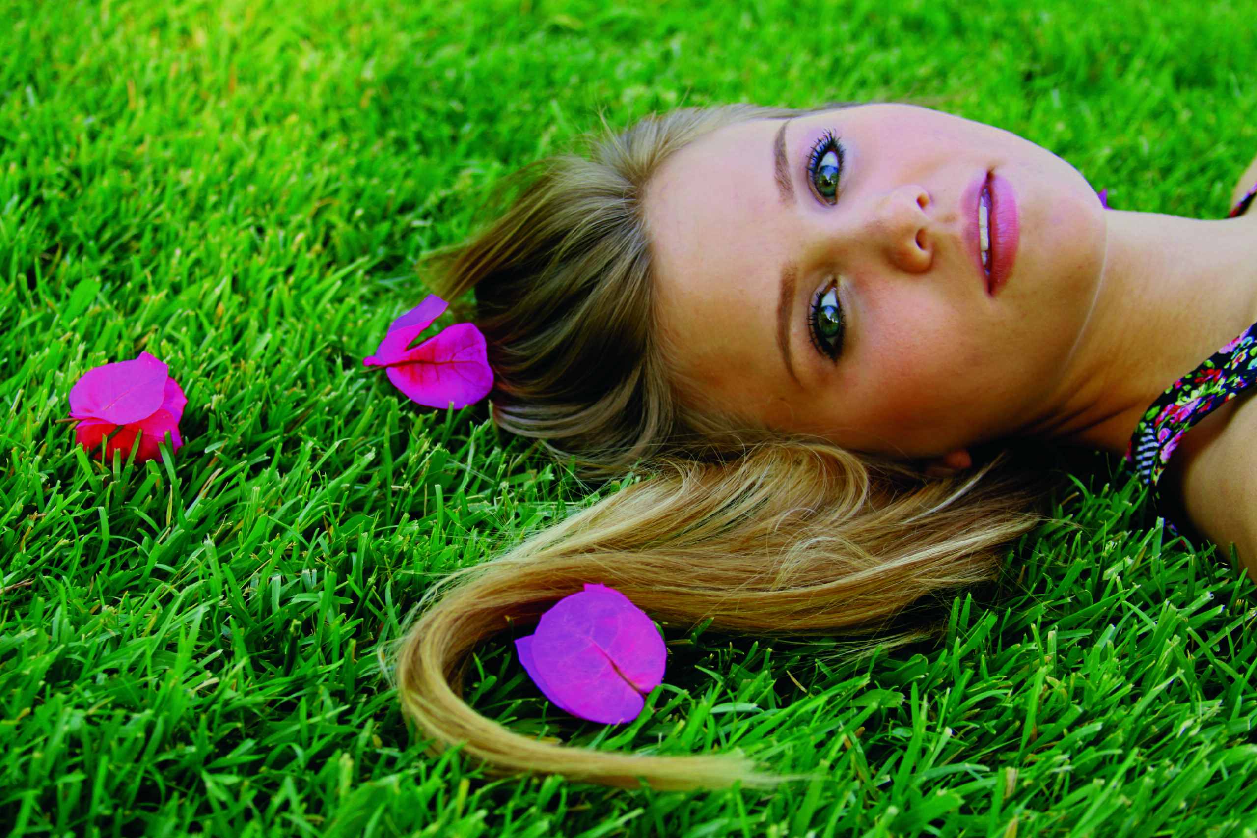 woman lying in grass