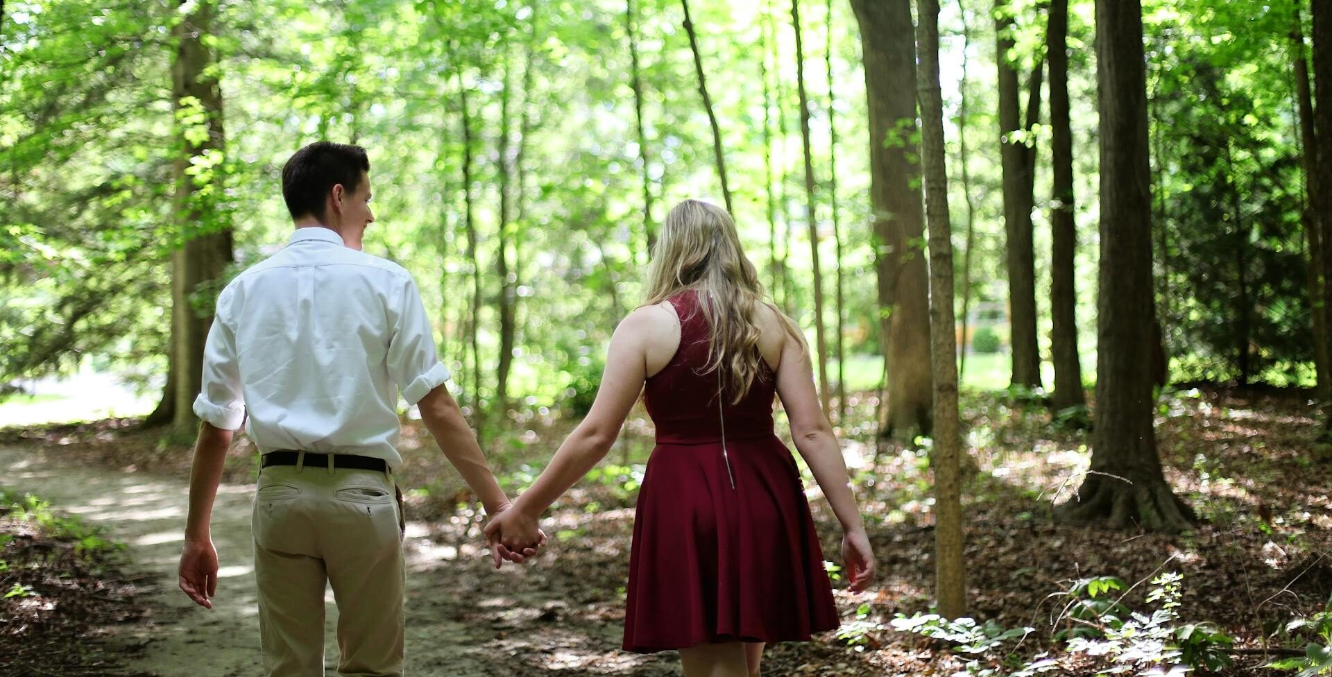 couple walking in forest