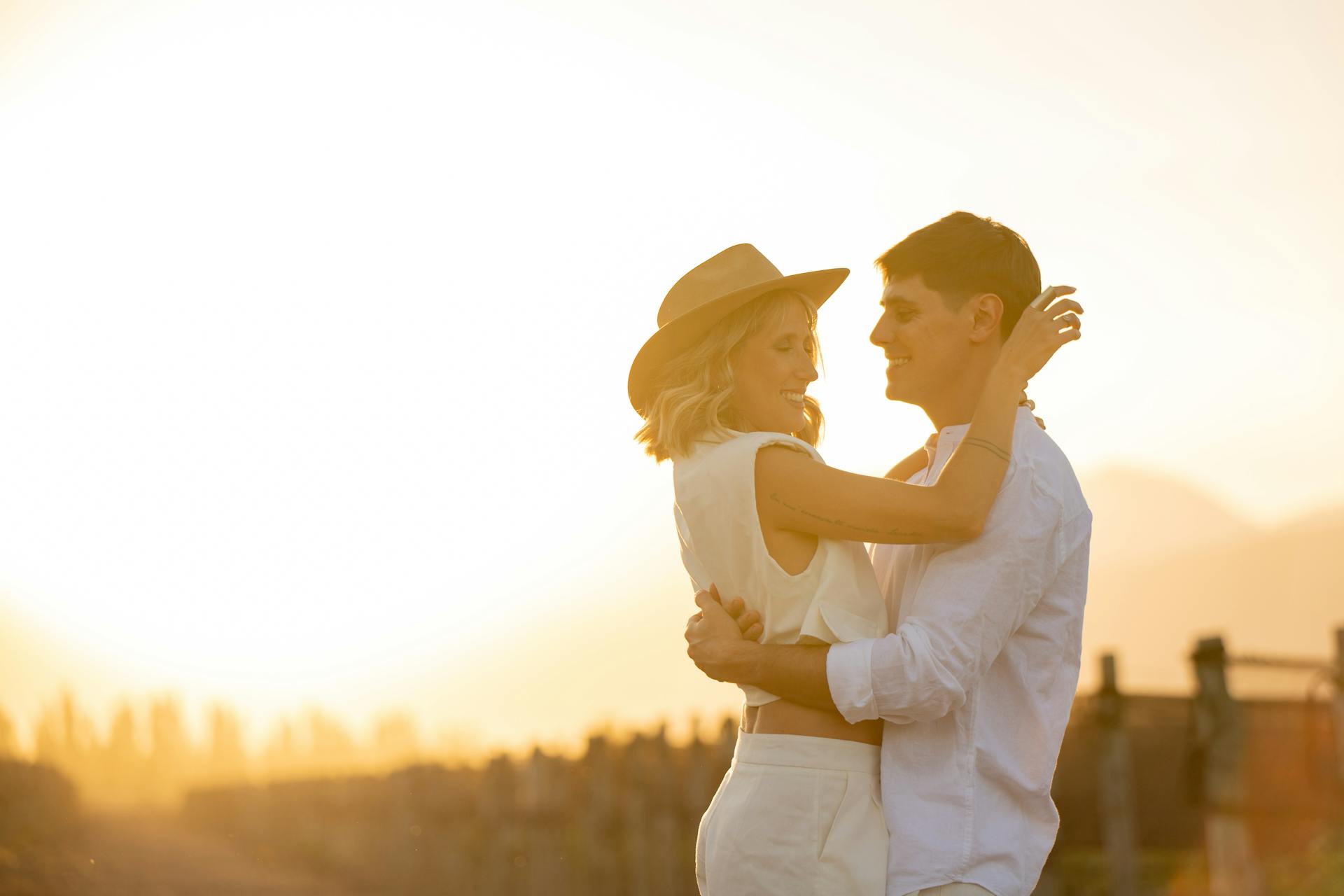 couple hugging in sun