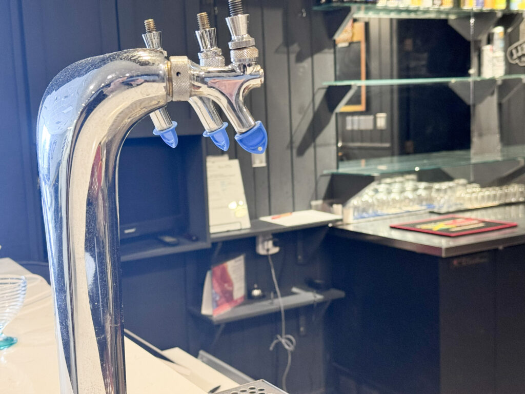 Draft beer taps at the Barrie Curling Club bar — on-site bar service for weddings Title: Barrie Curling Club Bar Service — On-Site Wedding Bar Barrie