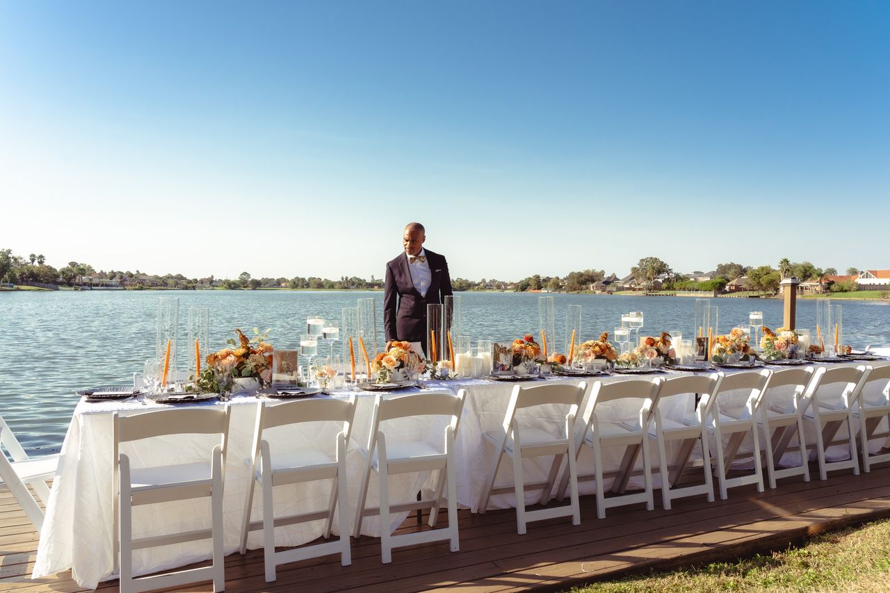 man by wedding table setup