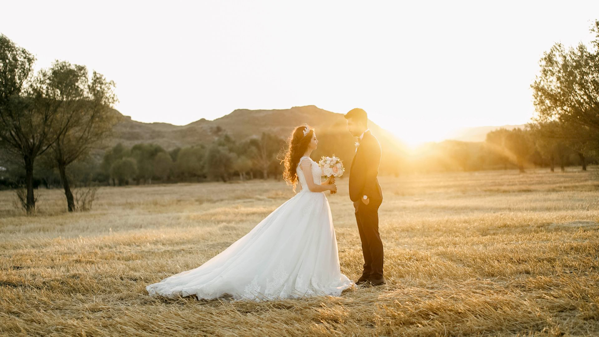 married couple sunset