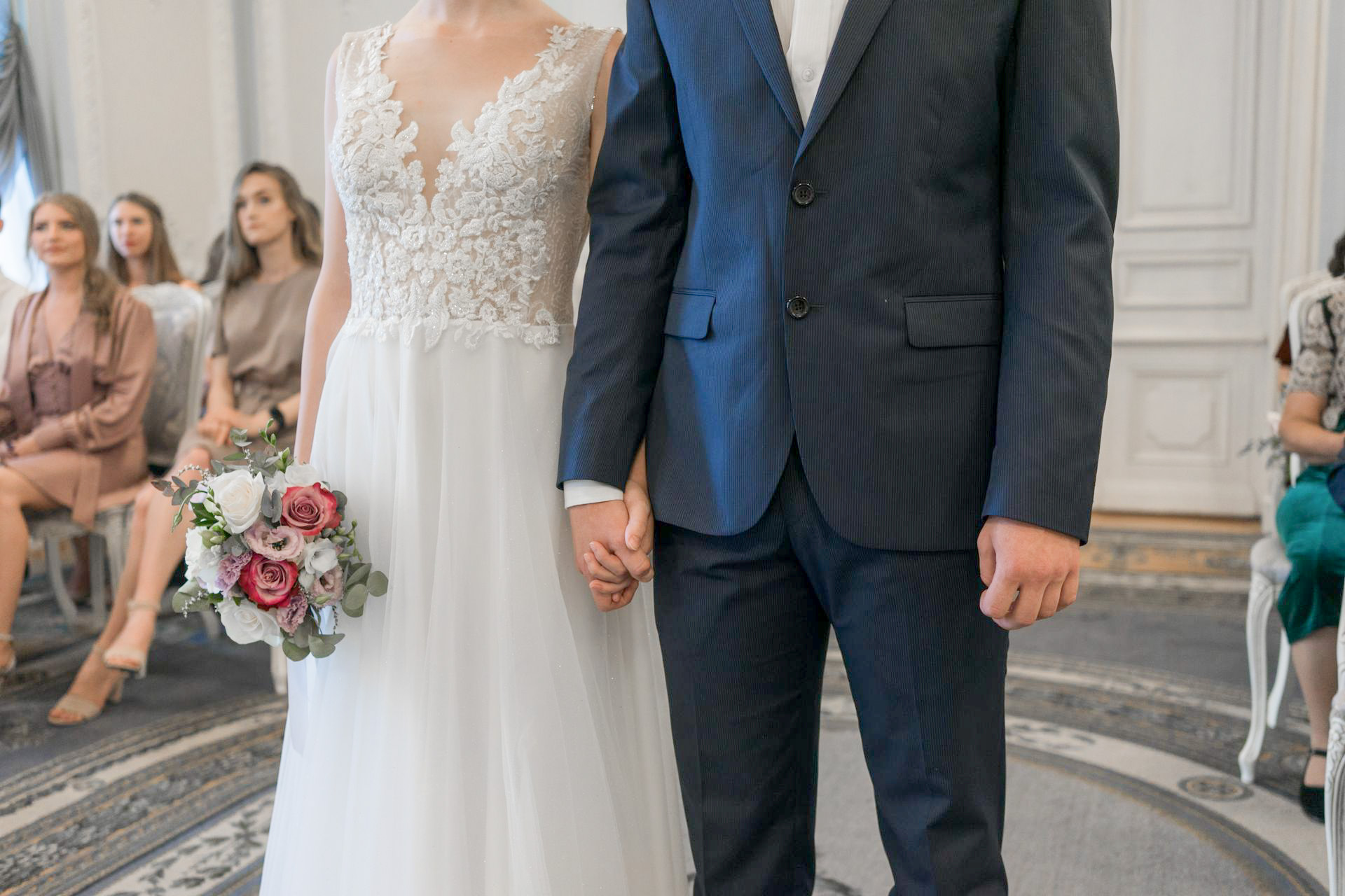 wedding couple holdings married
