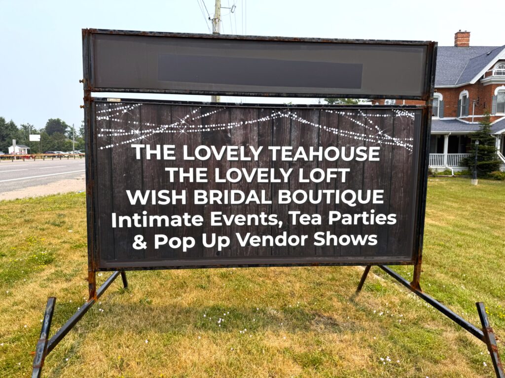 Sign for The Lovely Teahouse, The Lovely Loft and Wish Bridal Boutique