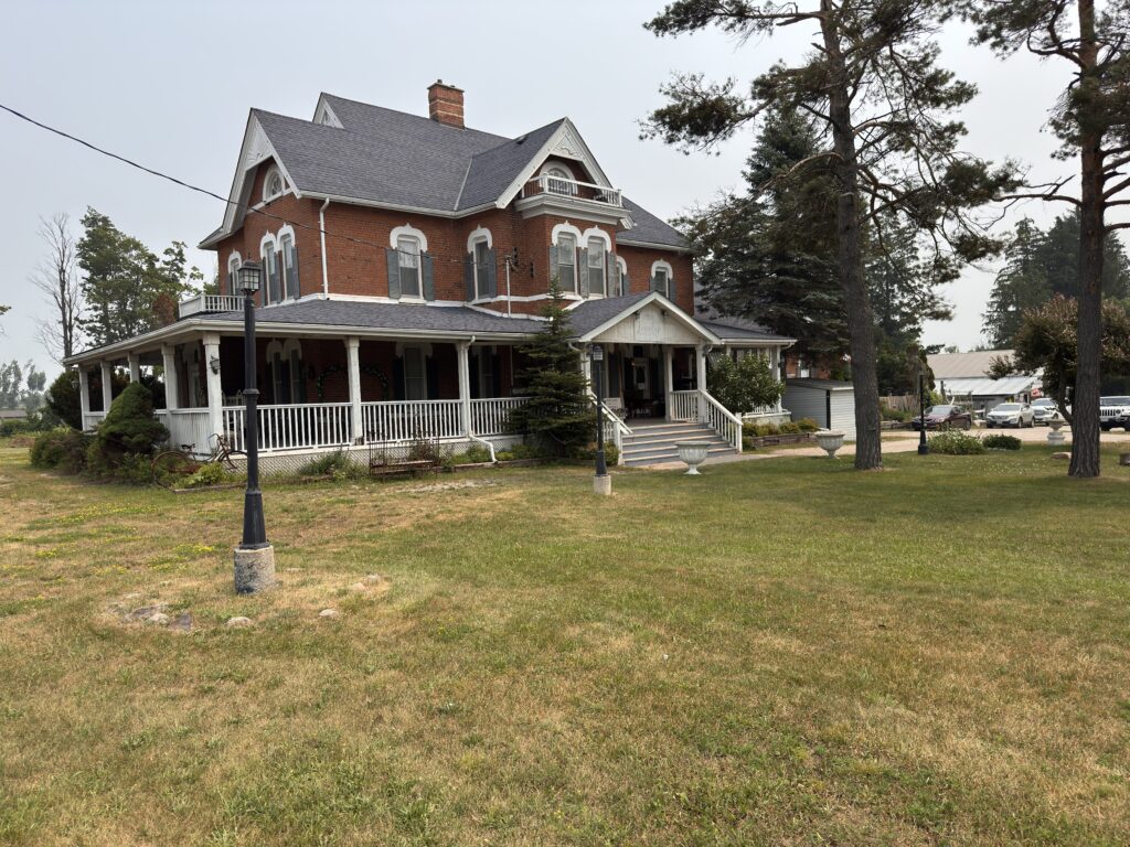 Exterior of The Lovely Teahouse, a historic house wedding venue in Oro Medonte