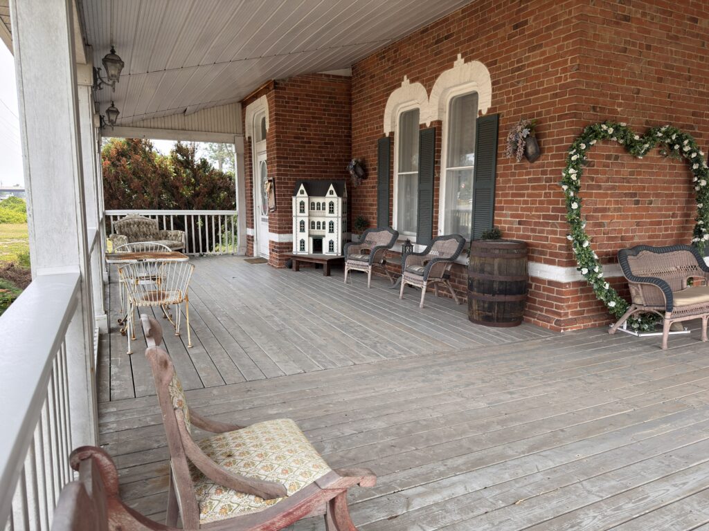 Porch swing seating at The Lovely Teahouse
